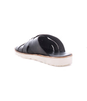 The Abraham Light by Bed|Stü is a black open-toe sandal featuring a woven leather upper, crisscross straps, and a white lightweight outsole, shown from the back side on a white background.