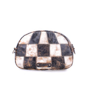 Abundance by Bed|Stü is a small zippered pouch made from sustainable reclaimed leather patches, featuring a distressed black and white checkerboard pattern and shown against a white background.