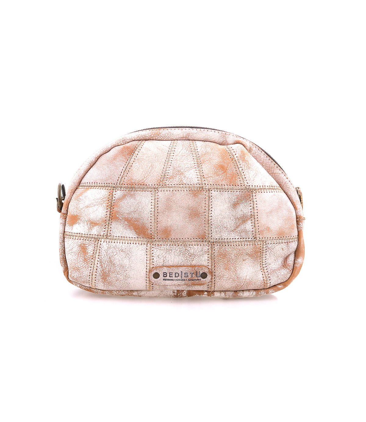 Introducing Abundance by Bed|Stü: a small tan and white patchwork pouch crafted from sustainable reclaimed leather, featuring a zipper closure, curved top, and a metal Bed|Stü label on the front. This compact crossbody bag is photographed against a plain white background.