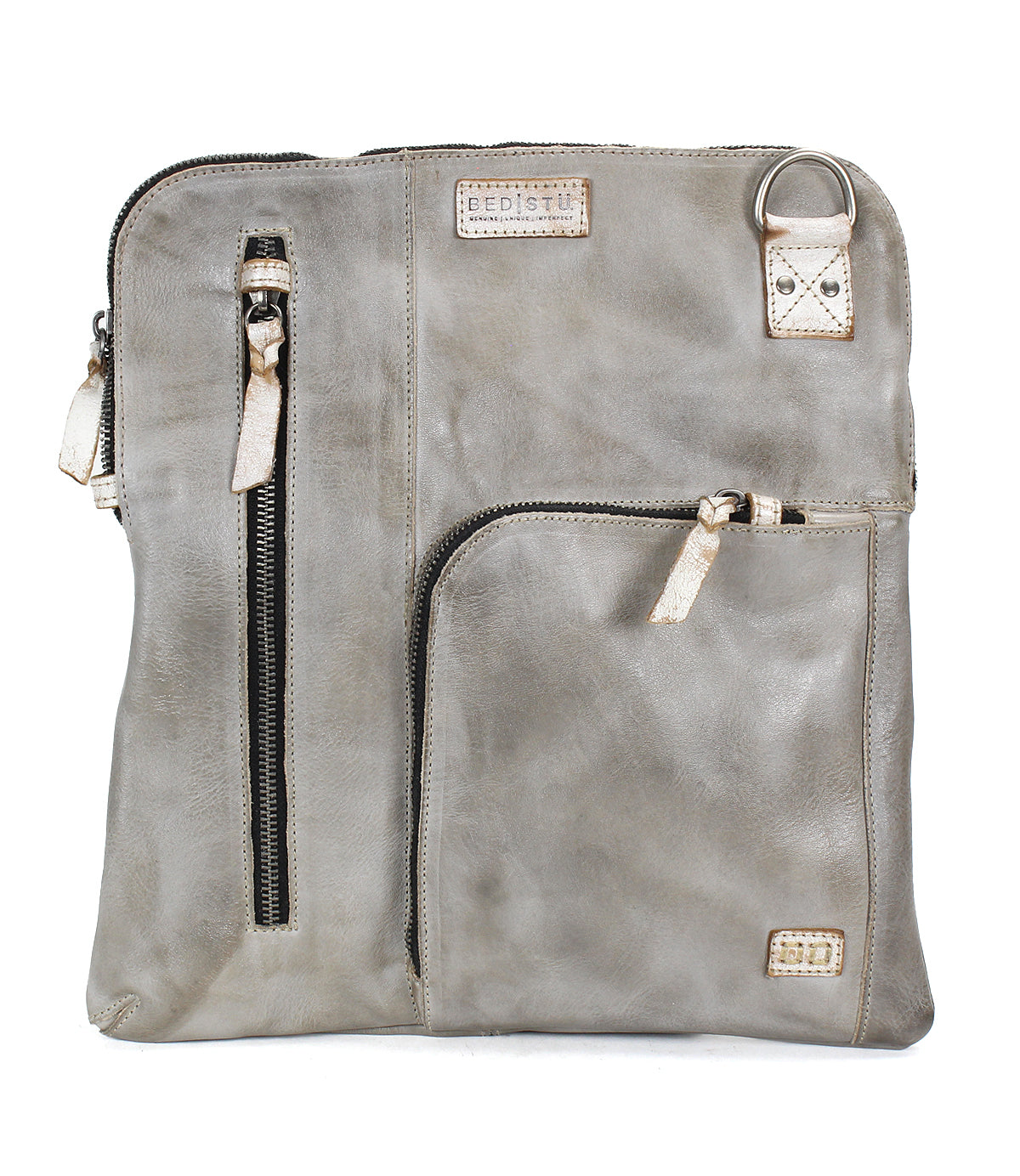 Introducing the Aiken by Bed|Stü—a square crossbody crafted from light gray full-grain leather, featuring two zippered pockets on the front, a small patch label, and a silver D-ring near the top right corner. The adjustable strap ensures comfortable and versatile wear.