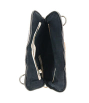 The Bed|Stü Aiken bag, crafted from full-grain black leather, features a zippered top, two spacious compartments, and a small inner pocket—displayed from above against a white background.
