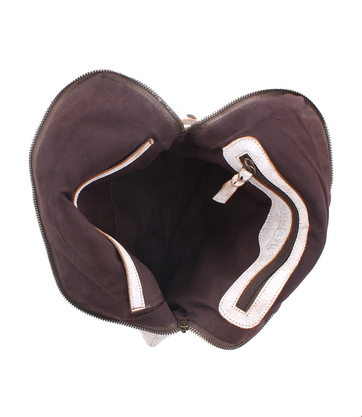 The Bed|Stü Aiken is shown opened from above, revealing its dark interior lining with one zippered pocket and one open pocket; it features an adjustable strap for versatile carrying.
