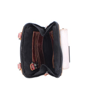 The Bed|Stü Alelike is a small zippered pouch featuring a black interior, brown stitched pockets, and a key ring holder—ideal as a compact purse for your travel essentials—shown open from a top-down view against a white background.