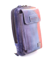Introducing the Bed|Stü Alelike—a compact and versatile leather crossbody purse featuring a flap pocket, zipper compartment, and the iconic Bed|Stü logo, all crafted in stunning purple and reddish tones. It’s perfect for carrying your travel essentials in style.