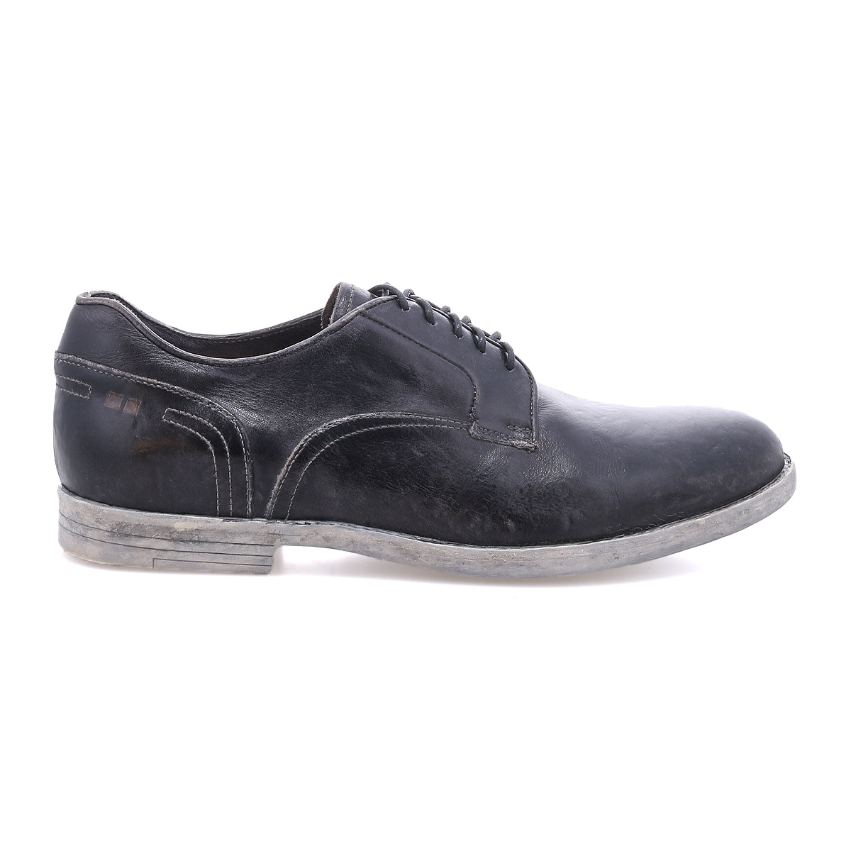 The Anchiano by Bed|Stü is a single black oxford shoe with laces, shown in a side view, showcasing visible stitching, a slightly worn sole, and crafted from distressed leather for added character.