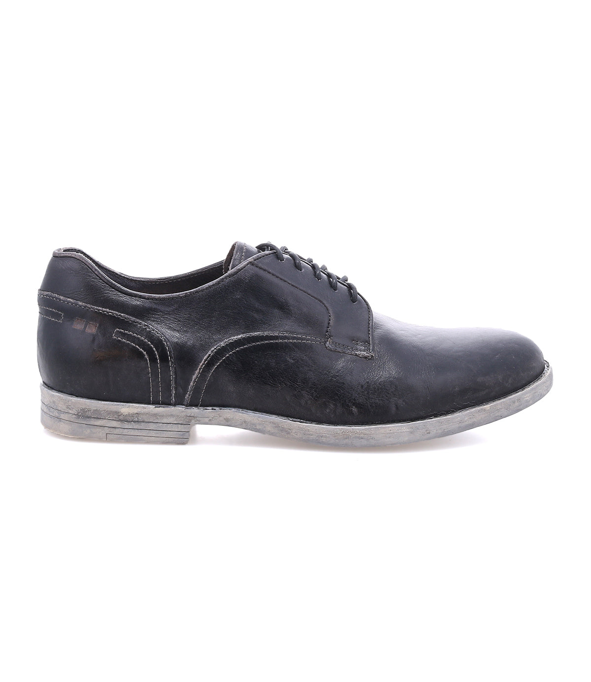The Anchiano by Bed|Stü is a single black oxford shoe with laces, shown in a side view, showcasing visible stitching, a slightly worn sole, and crafted from distressed leather for added character.