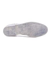 The image shows the bottom sole of a worn Bed|Stü Anchiano dress shoe, viewed from directly underneath. The flexible sole appears scuffed and displays signs of use, characteristic of well-loved oxford shoes.