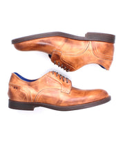 A pair of Bed|Stü Anchiano brown distressed leather oxford shoes with dark, flexible soles are displayed side by side—one facing left and the other facing right—on a white background.