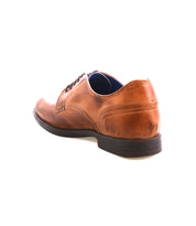 The Bed|Stü Anchiano is a brown distressed leather oxford shoe featuring a black flexible sole, shown from the back on a white background.