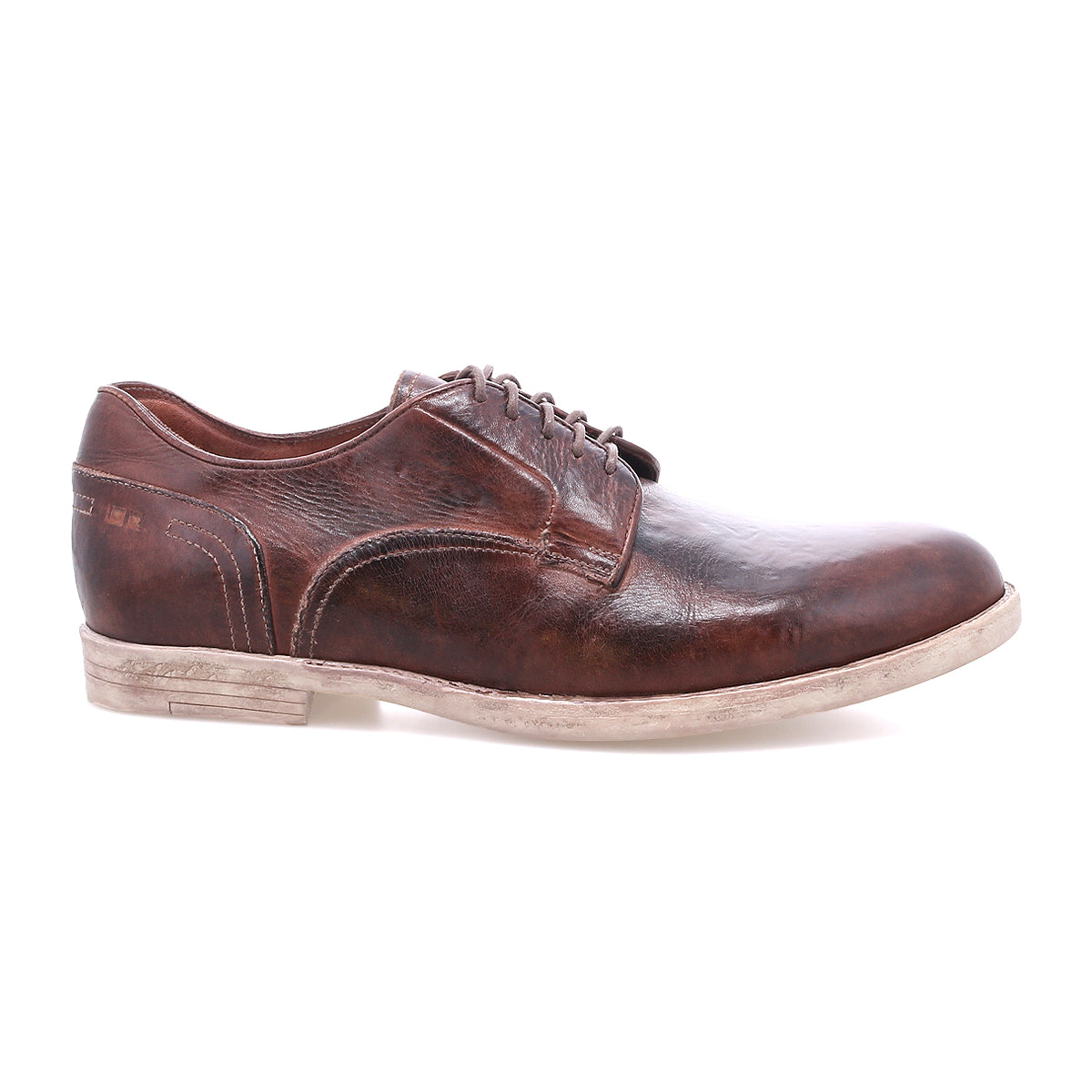 The Bed|Stü Anchiano is a brown leather oxford shoe with laces, showcasing a flexible sole and a slightly distressed leather finish, displayed in side profile on a white background.