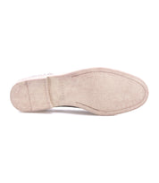 The image shows the outsole of the Anchiano oxford shoe by Bed|Stü, viewed from below. The light-colored sole features a smooth surface with minimal tread and a small stacked heel. Its flexible design enhances comfort while maintaining an elegant appearance.