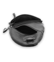 The Bed|Stü Andie is a black leather pouch with two zippered compartments, displayed open against a white background. A small adjustable strap and metal clip can be seen on the left side of this leather sling bag.