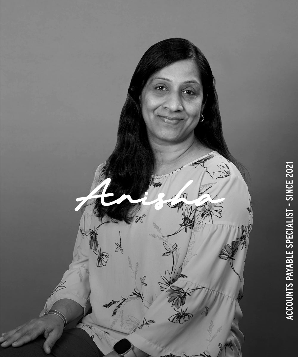 Black-and-white portrait of a woman with the name “Anisha” overlaid and vertical text reading “Accounts Payable Specialist · Since 2021.”