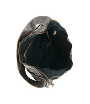 Top view of an open Bed|Stü Argus handcrafted leather shoulder bag with a zipper, featuring a spacious black interior, an inner pocket, and a small metal clasp.