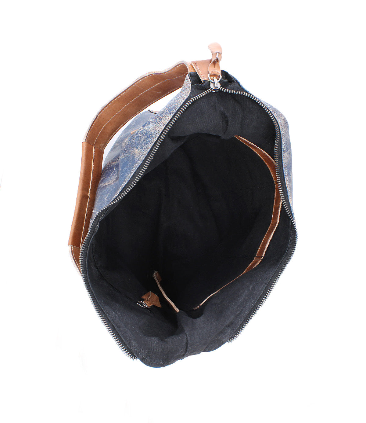 Top view of the Bed|Stü Argus bag, featuring an open blue and brown patchwork leather design with a zipper, revealing a spacious black interior and an inner brown pocket.