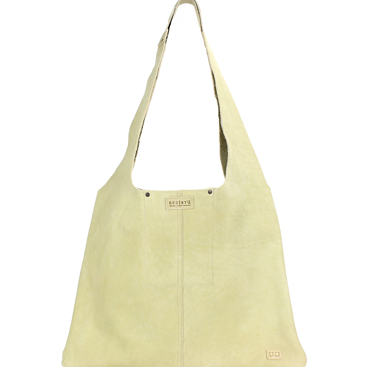 The Ariel II by Bed|Stü is a spacious beige leather shoulder bag featuring a single wide strap, minimal stitching, and small brand tags visible on the front.