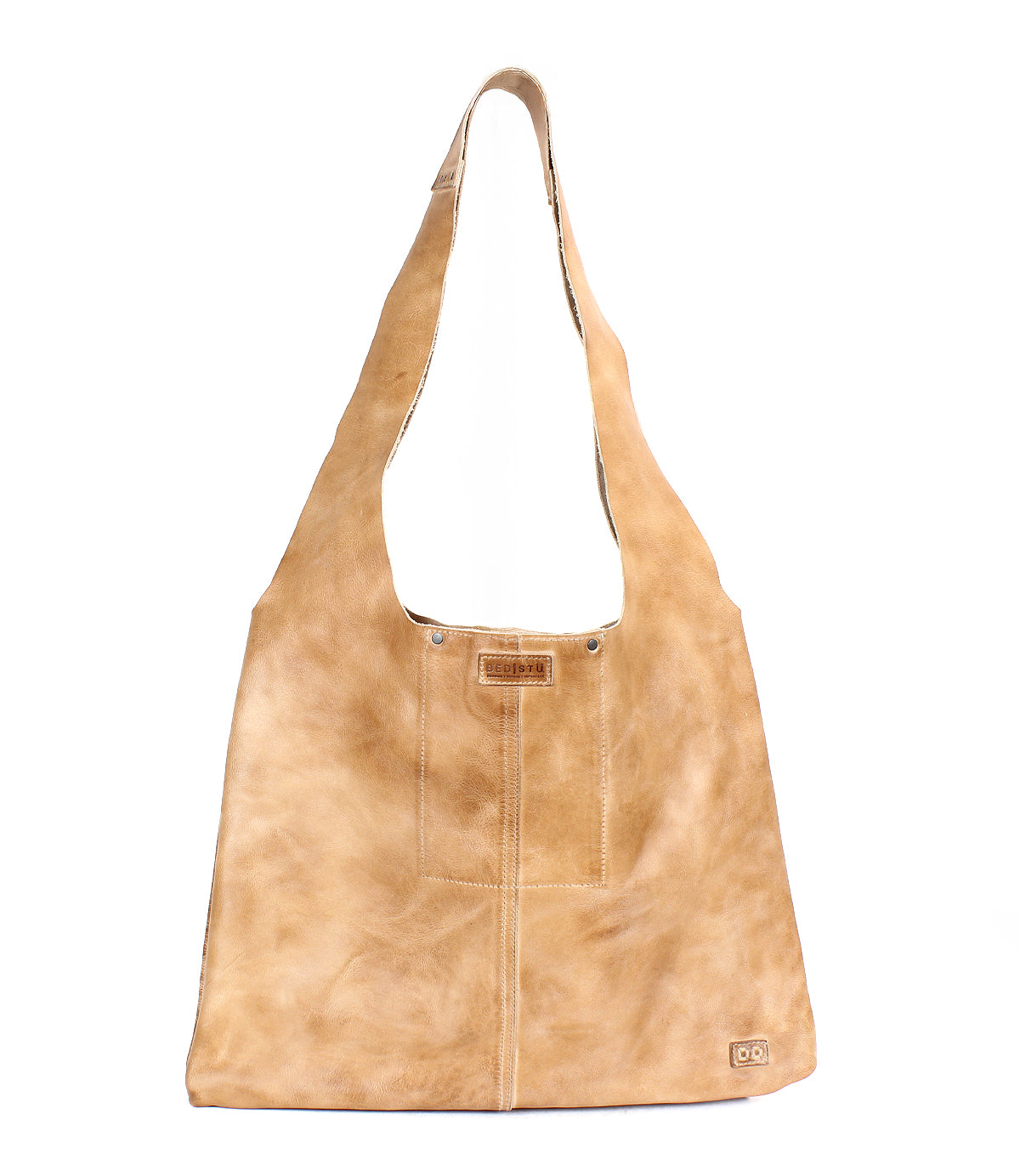 Spacious and lightweight, the Ariel II tote bag by Bed|Stü boasts a tan leather exterior, wide shoulder strap, rectangular body, visible stitching, and a small logo patch at the bottom right corner.