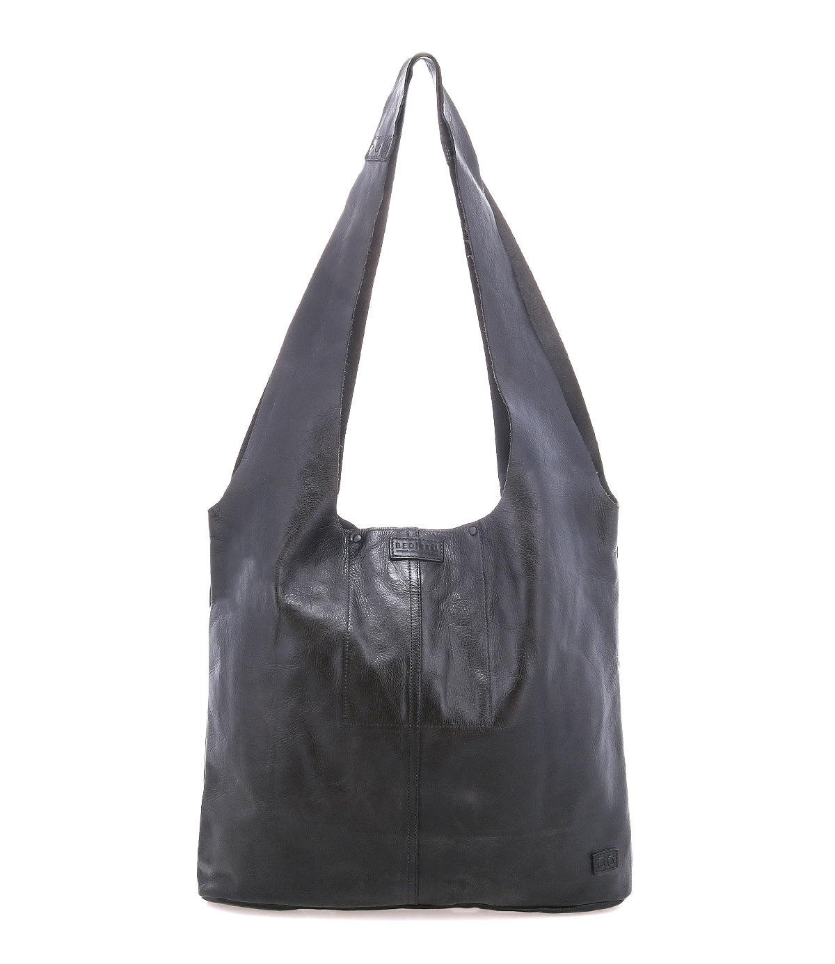 The Ariel Max by Bed|Stü is a large black hand-finished leather shoulder bag featuring a wide strap, a rectangular body, and minimal stitching details. Designed with a spacious interior, it is photographed against a plain white background.