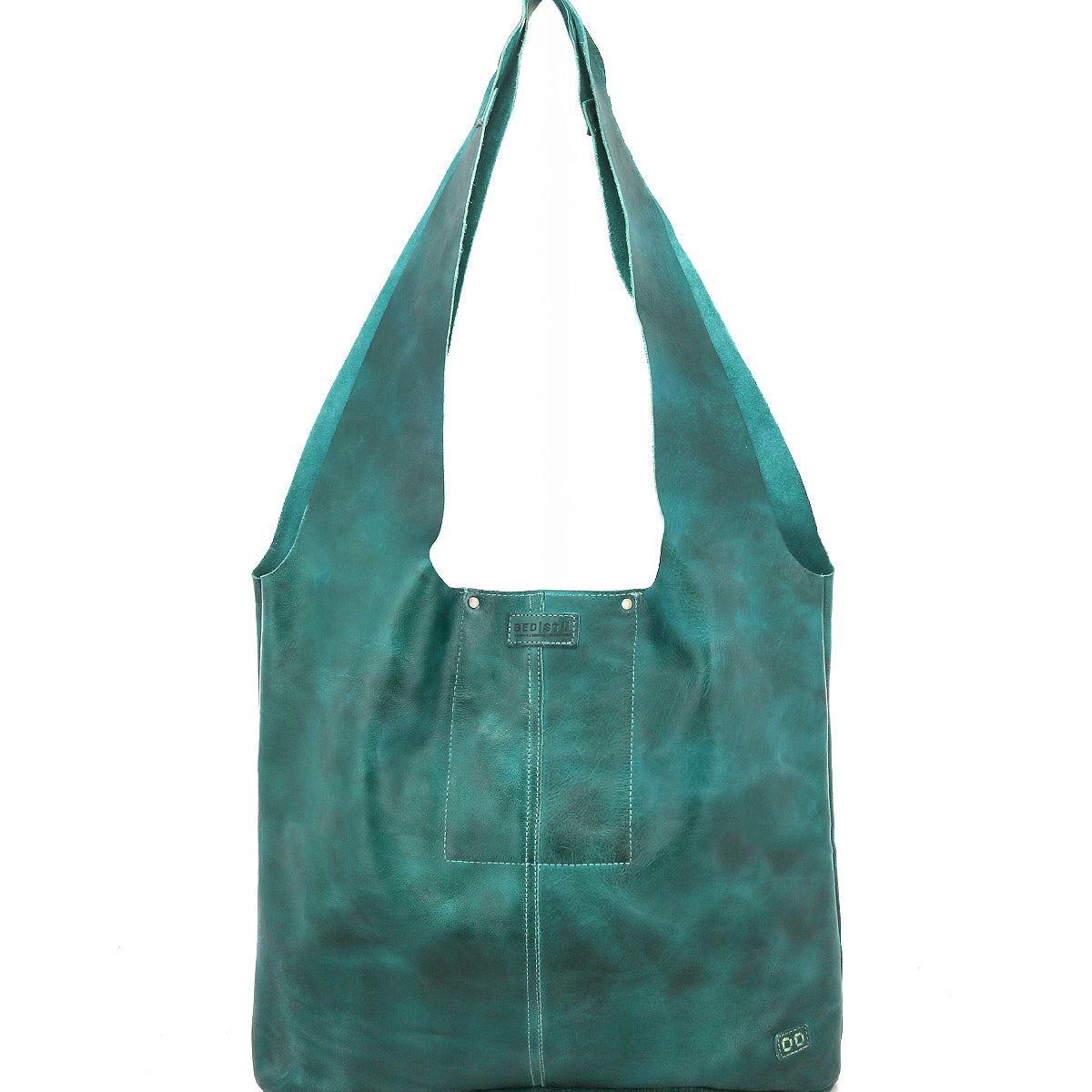 The Ariel Max by Bed|Stü is a teal hand-finished leather shoulder bag with wide straps, a square front pocket, decorative stitching, and a small metal logo in the lower right corner. This oversized tote offers a spacious interior and is shown against a plain white background.