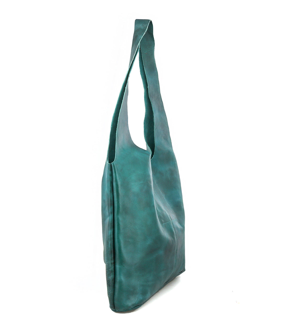 The Bed|Stü Ariel Max, a teal leather shoulder bag with a single wide strap and hand-finished details for a luxurious touch, is shown standing upright on a white background. Its spacious interior ensures it’s as practical as it is stylish.