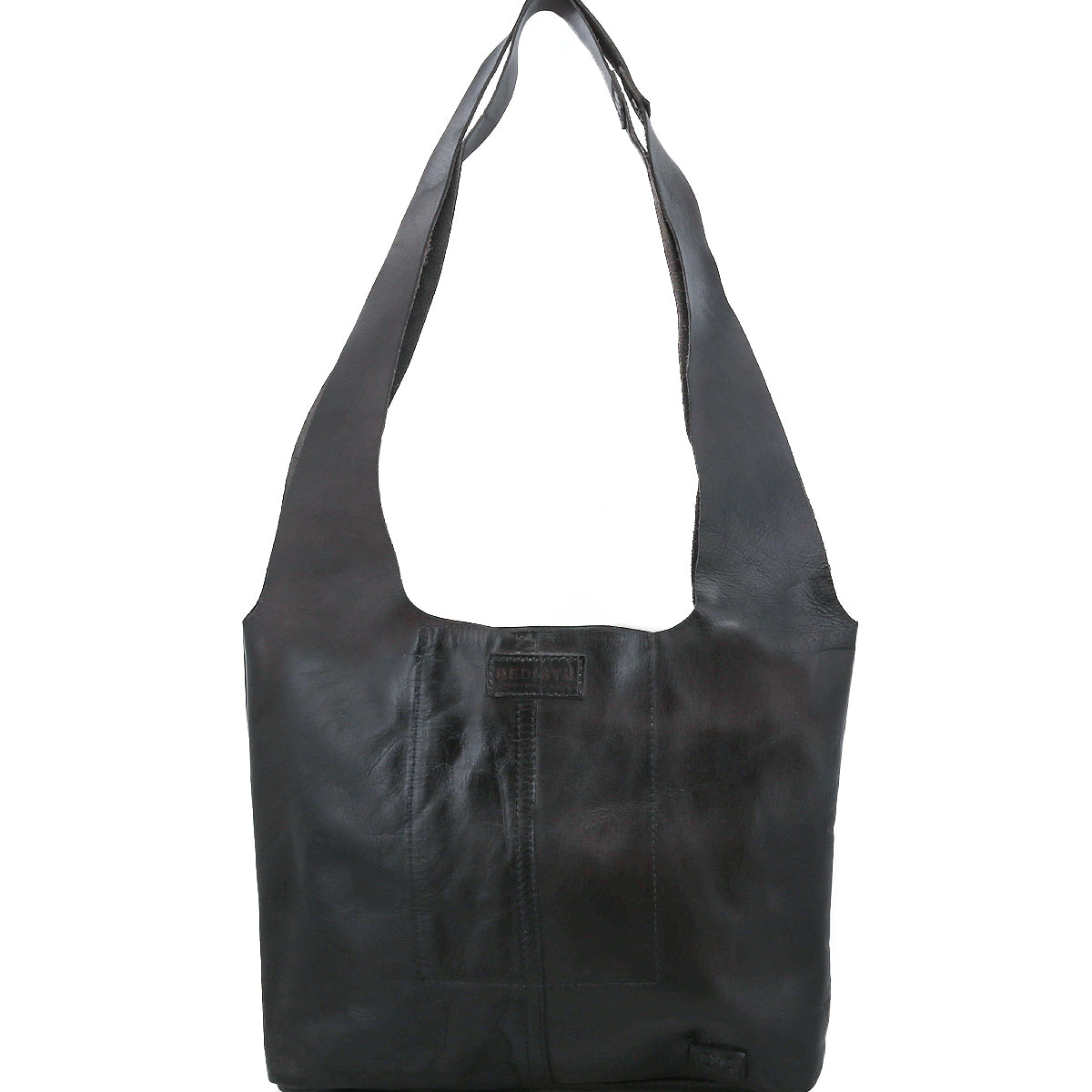 The Ariel Mid by Bed|Stü is a black artisanal shoulder bag made from vegetable-tanned leather, featuring a wide strap, front stitching details, and a rectangular logo patch on the upper front center.