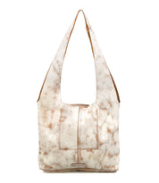 The Ariel Mid by Bed|Stü is an artisanal shoulder bag in marbled beige and brown vegetable-tanned leather, featuring a wide strap, front pouch pocket, and visible stitching, showcased against a white background.