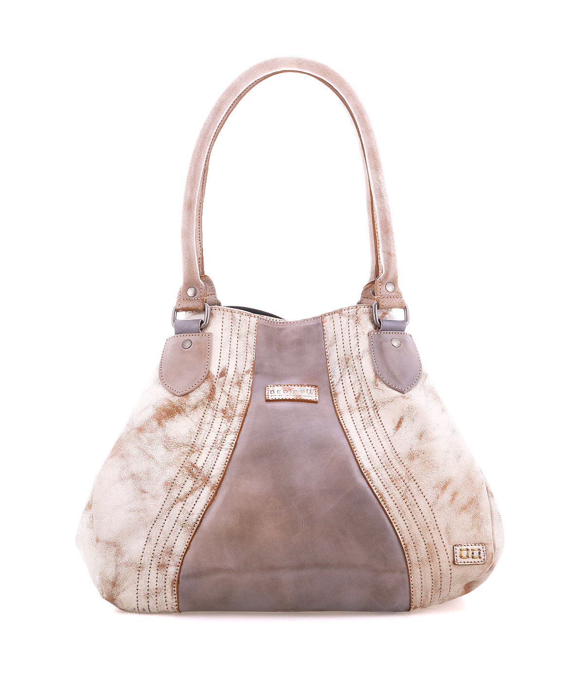 The Bed|Stü Astana is a modern tan and brown suede handbag featuring two handles, stitched detailing, and a small metal logo plate on the bottom right corner, shown against a white background.