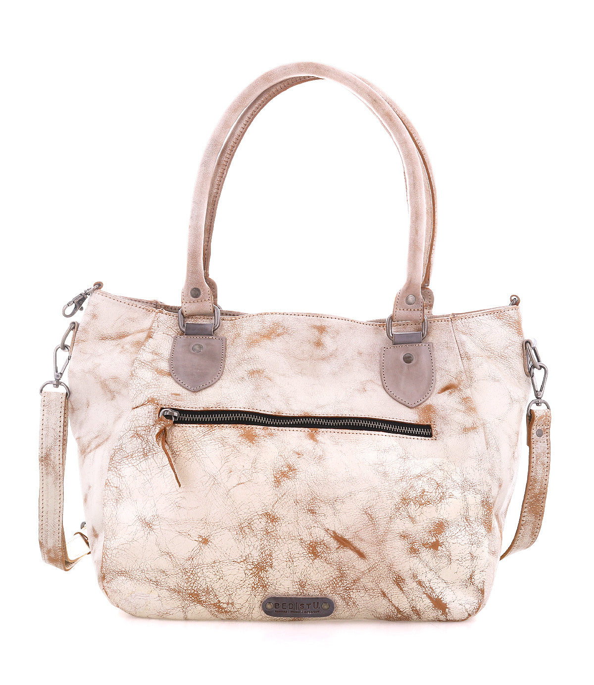 Introducing the Astana by Bed|Stü, a beige and brown marbled modern handbag inspired by classic vintage bowling bag style. It features two sturdy handles, a front zip pocket, detachable shoulder strap, and striking metal hardware. Photographed on a white background, the Astana is the perfect everyday bag.