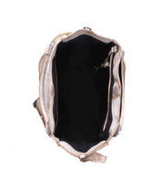 Top view of the Bed|Stü Astana handbag in beige, featuring a black interior, spacious compartment, light-colored straps, and a small side pocket with a clasp.