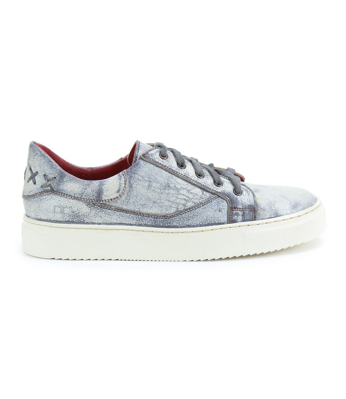 The Bed|Stü Azeli is a single gray, distressed-style leather sneaker featuring a white, durable rubber outsole, detailed side stitching, and two X-shaped stitches near the heel—crafted for all-day comfort.