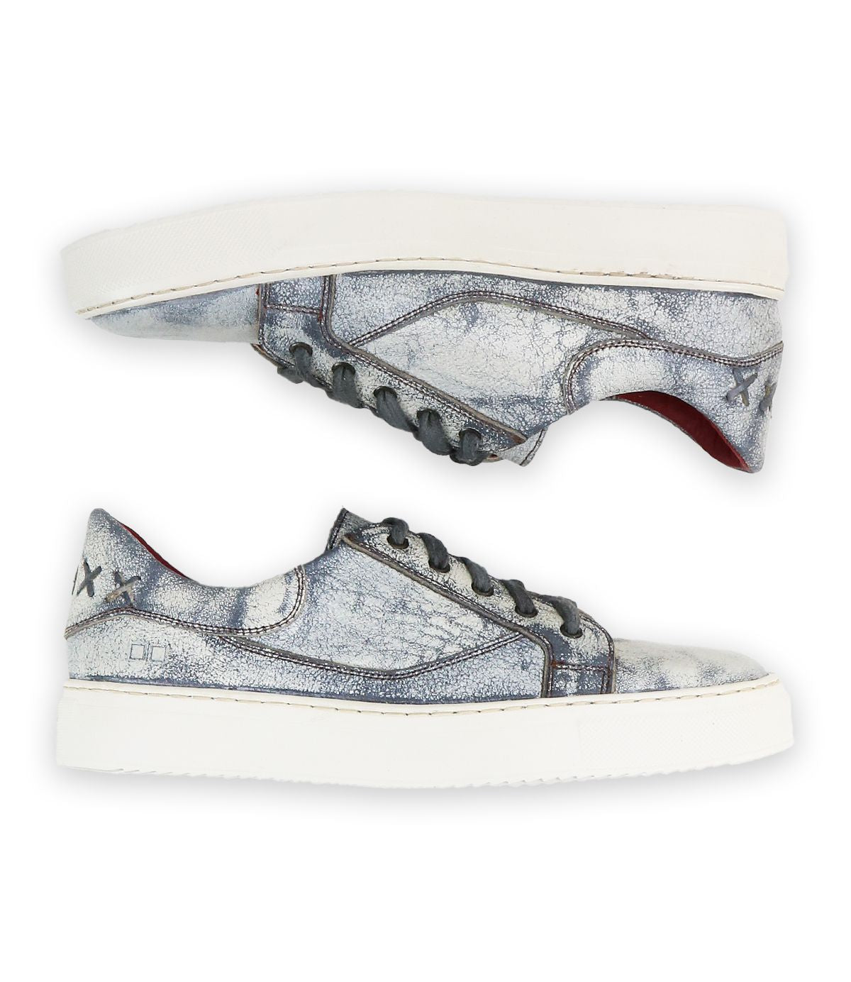 Two gray distressed low-top Azeli leather sneakers by Bed|Stü, featuring white durable rubber outsoles, black laces, and stitched star details on the heels, are shown from the side against a white background for all-day comfort.