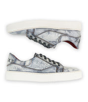 Two gray distressed low-top Azeli leather sneakers by Bed|Stü, featuring white durable rubber outsoles, black laces, and stitched star details on the heels, are shown from the side against a white background for all-day comfort.