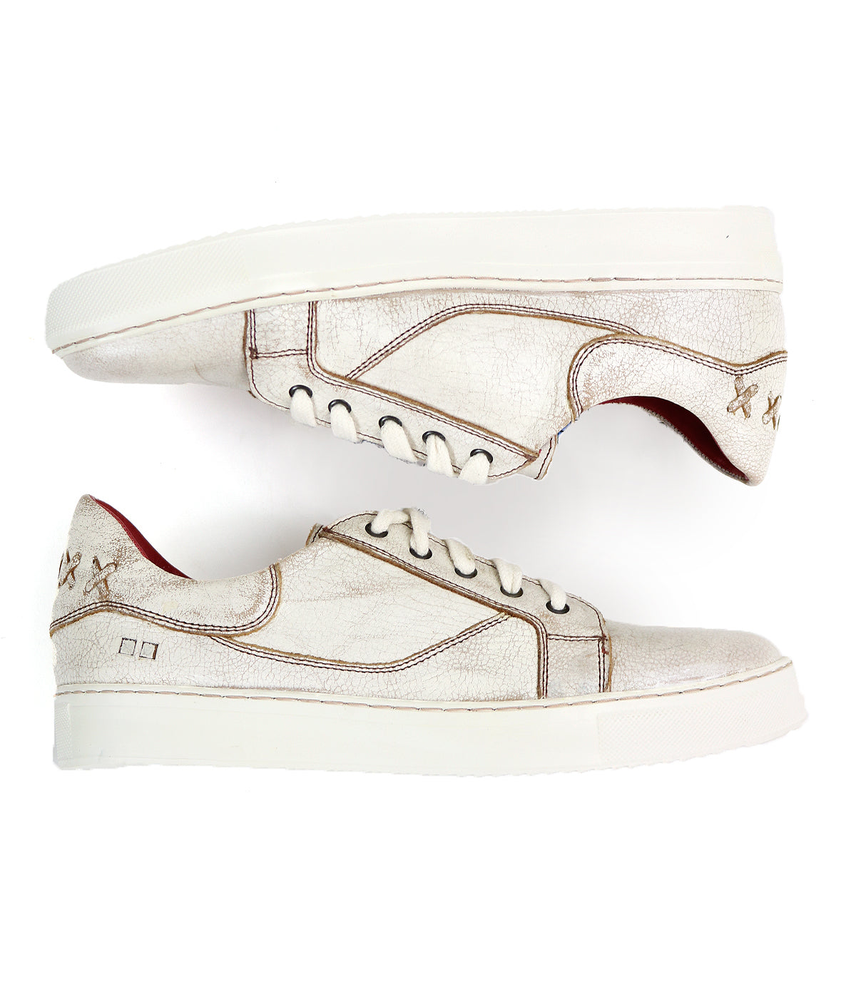 Introducing the Azeli by Bed|Stü: a pair of off-white low-top leather sneakers with visible brown stitching, white laces, and a thick white sole featuring a durable rubber outsole—displayed side by side to showcase their all-day comfort.