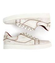 Introducing the Azeli by Bed|Stü: a pair of off-white low-top leather sneakers with visible brown stitching, white laces, and a thick white sole featuring a durable rubber outsole—displayed side by side to showcase their all-day comfort.