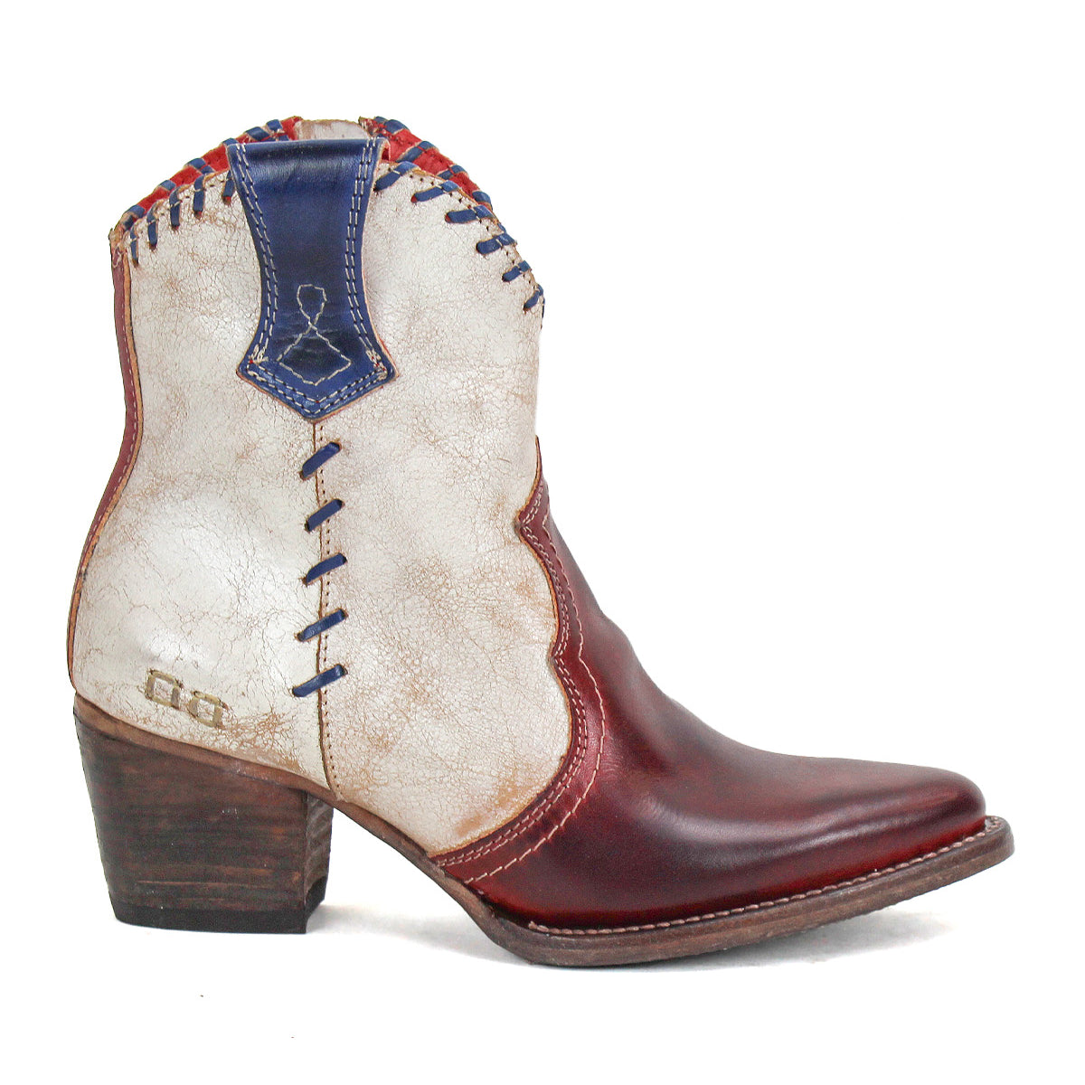 Showcasing artisanal craftsmanship for an authentic Western-inspired look, the Baila II by Bed|Stü features a pointed toe, short wooden heel, red and white leather upper with blue detailing, and decorative stitching.