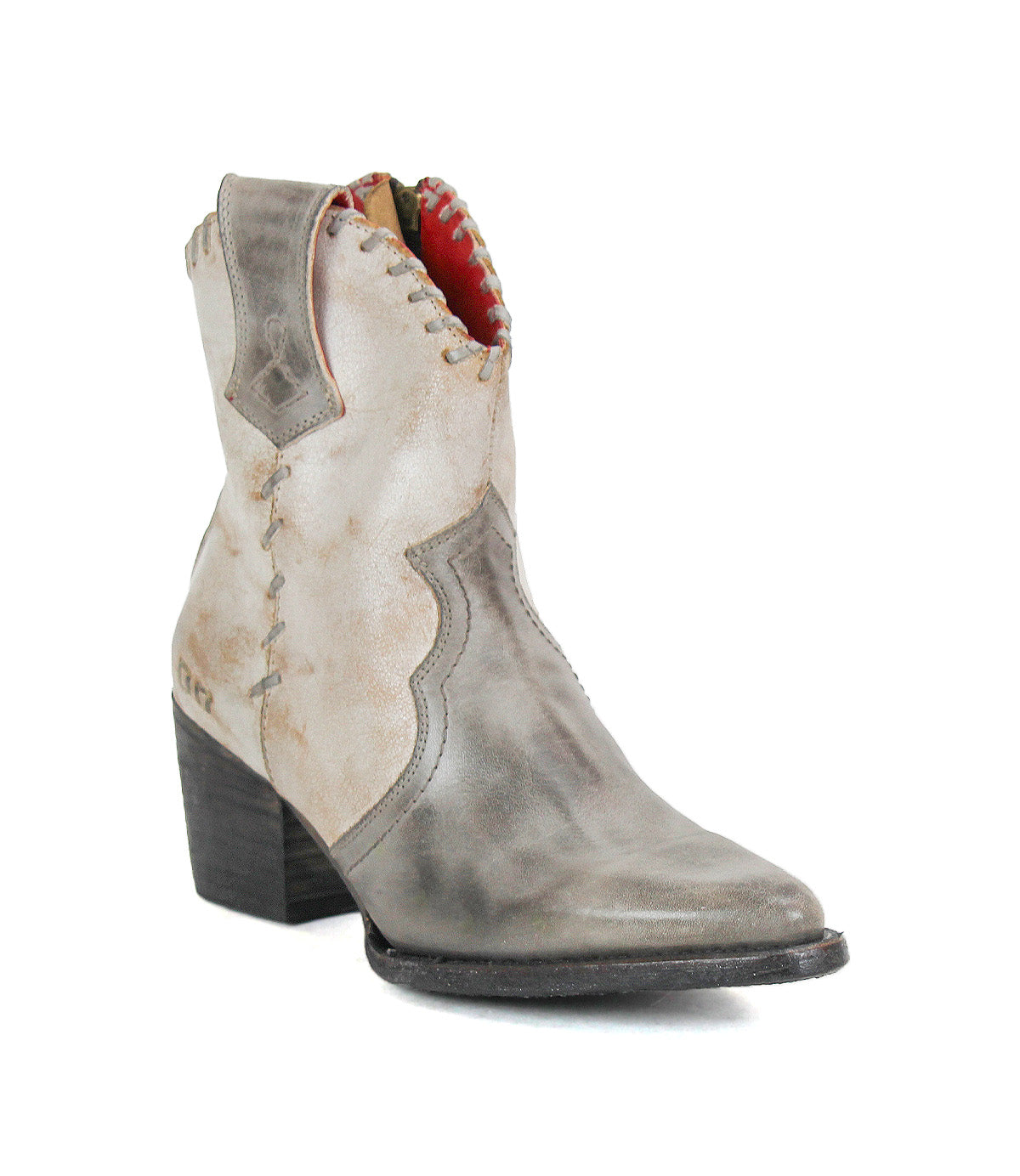 The Baila II by Bed|Stü is a single distressed gray leather ankle boot featuring artisanal construction, a pointed toe, decorative stitching, a red inner lining, and a chunky stacked heel—effortlessly blending Western-inspired rugged charm with sophisticated detail.