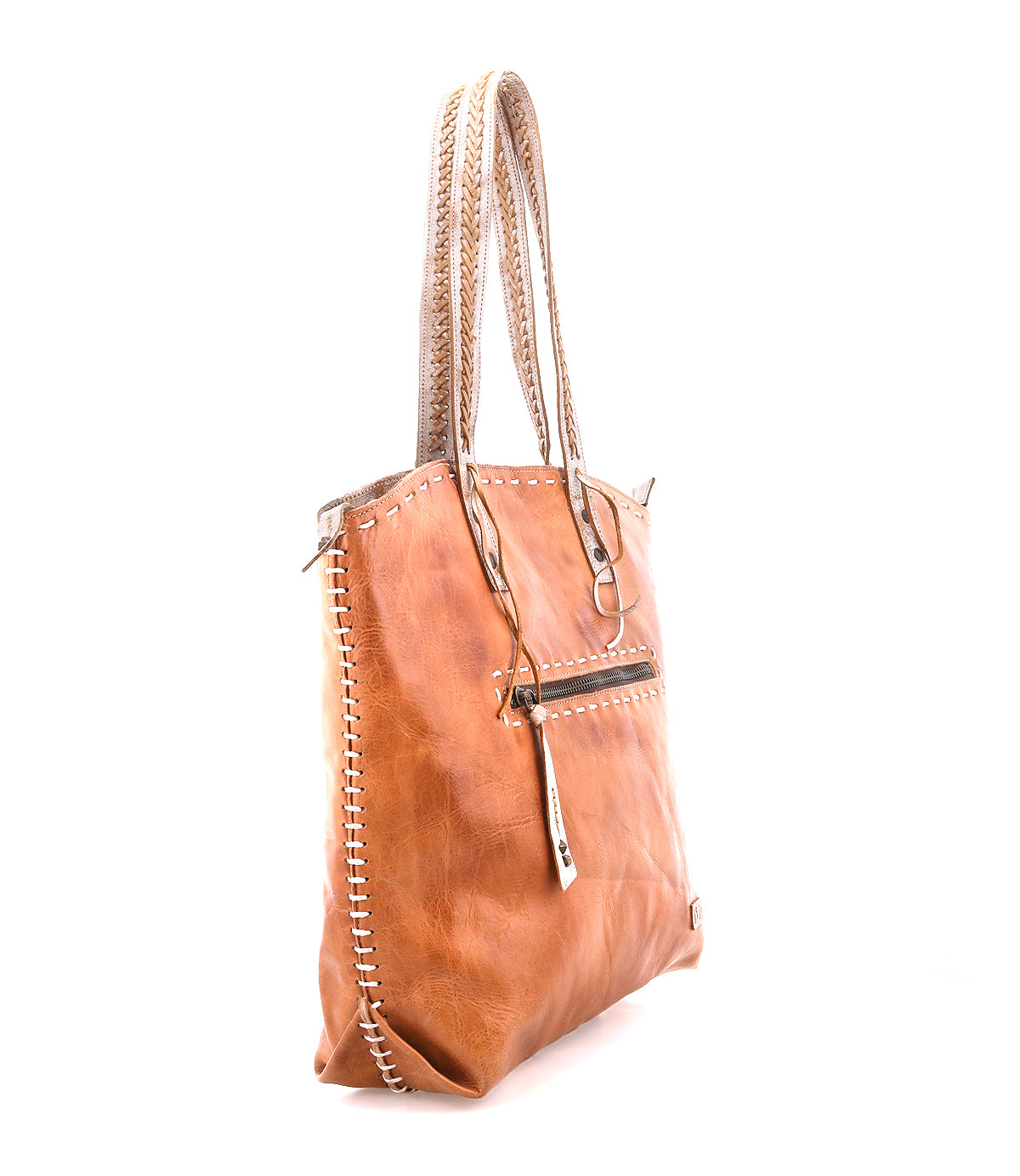 The Bed|Stü Barra II tan leather handcrafted tote features braided handles, visible edge stitching, multiple organizational compartments for easy access, and an exterior zippered pocket, shown here against a white background.