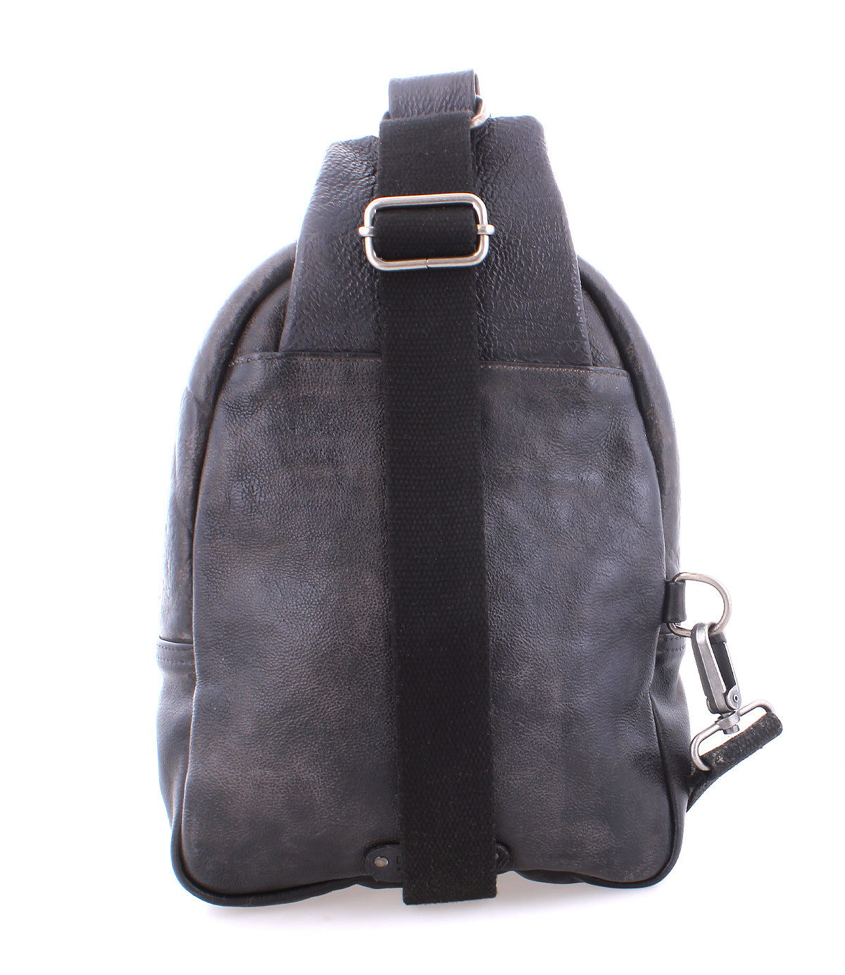 Side view of the Beau backpack by Bed|Stü in black leather, featuring a black adjustable strap, metal buckle, and a metal clasp attachment at the bottom right corner. This compact bag seamlessly blends sleek style with convenient functionality.