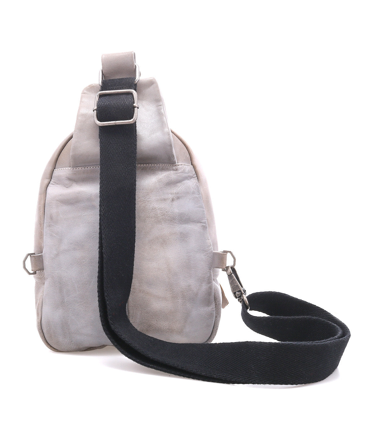 The Beau by Bed|Stü is a small, light gray leather sling bag featuring a black adjustable shoulder strap, displayed from the back against a white background.