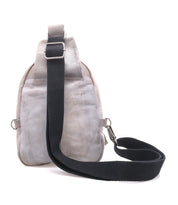 The Beau by Bed|Stü is a small, light gray leather sling bag featuring a black adjustable shoulder strap, displayed from the back against a white background.