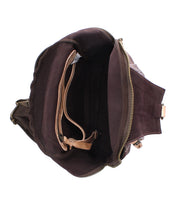 Top view of the Bed|Stü Beau brown leather sling bag, displaying its spacious main compartment, inner zippered pocket, and side pocket—all empty.
