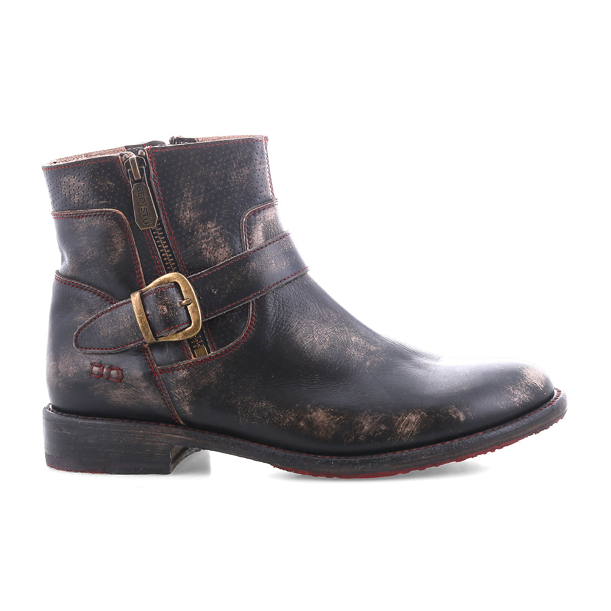 The Bed|Stü Becca is a single distressed black leather ankle engineer boot featuring a side zipper, a decorative ankle buckle, and a low heel, with a sturdy leather shaft; shown in profile against a white background.