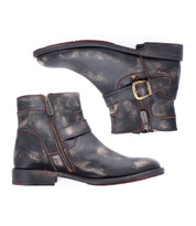 The Becca boots by Bed|Stü are a pair of distressed black leather engineer boots featuring side zippers, decorative straps, and brass ankle buckles, shown in a side view against a white background.