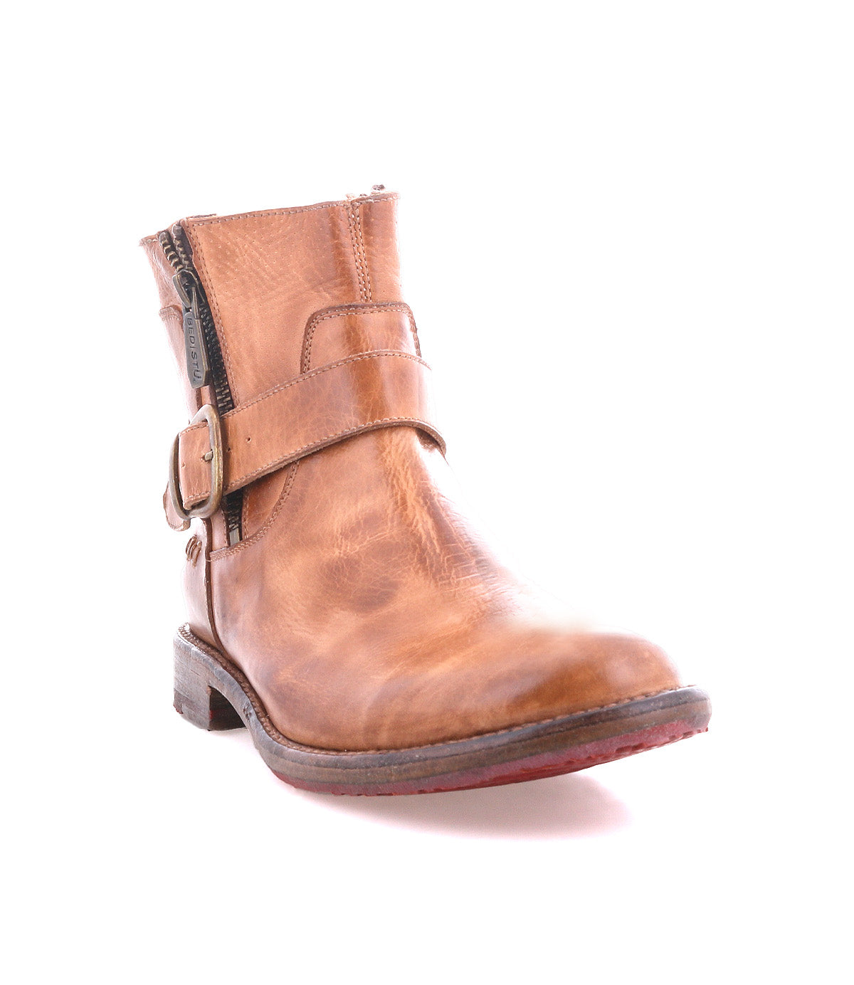 Becca by Bed|Stü is a brown leather engineer boot with a side zipper and decorative ankle buckle, featuring a low heel, a slightly worn finish, and a sturdy leather shaft, photographed on a white background.