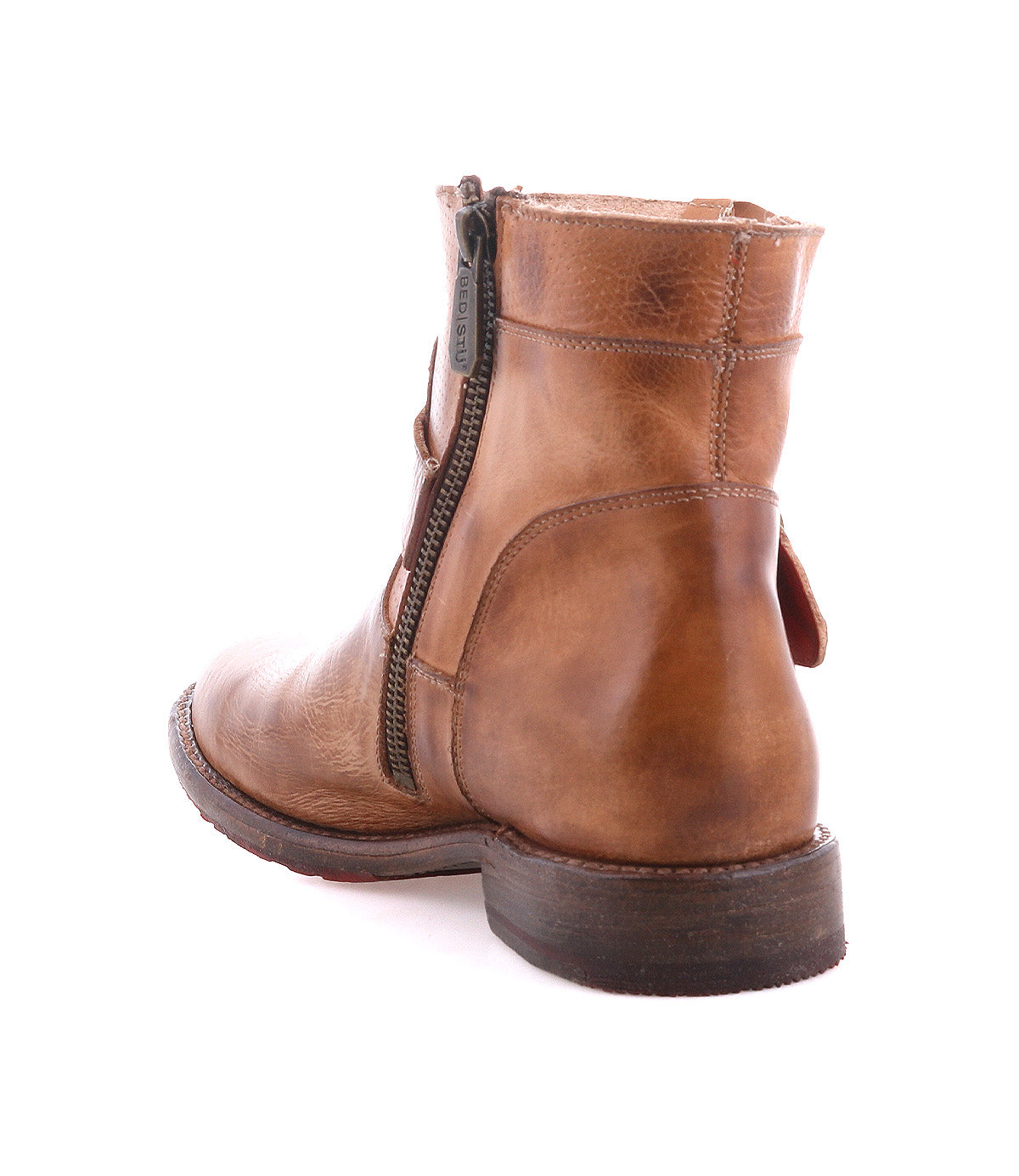 The Becca by Bed|Stü is a brown leather ankle boot featuring a sturdy leather shaft, side zipper, low heel, and visible stitching, displayed from a rear three-quarter angle on a white background.