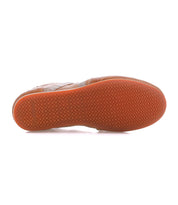 The Bed|Stü Bingo II brown leather sneaker is pictured from the bottom, highlighting its orange EXTRALIGHT outsole and textured, crosshatched tread pattern.