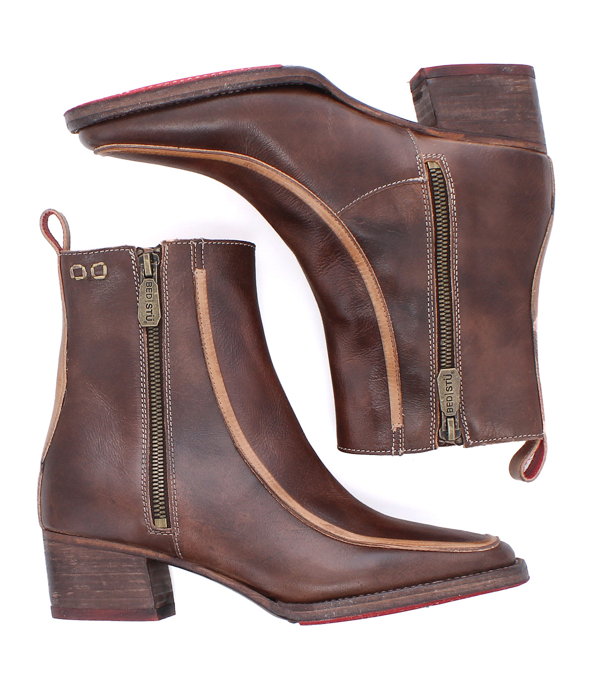The Bitsy boots by Bed|Stü are brown leather ankle boots featuring side zippers, stacked heels, eye-catching red soles, and a chic square-toe design. Shown from the side and bottom views on a white background.