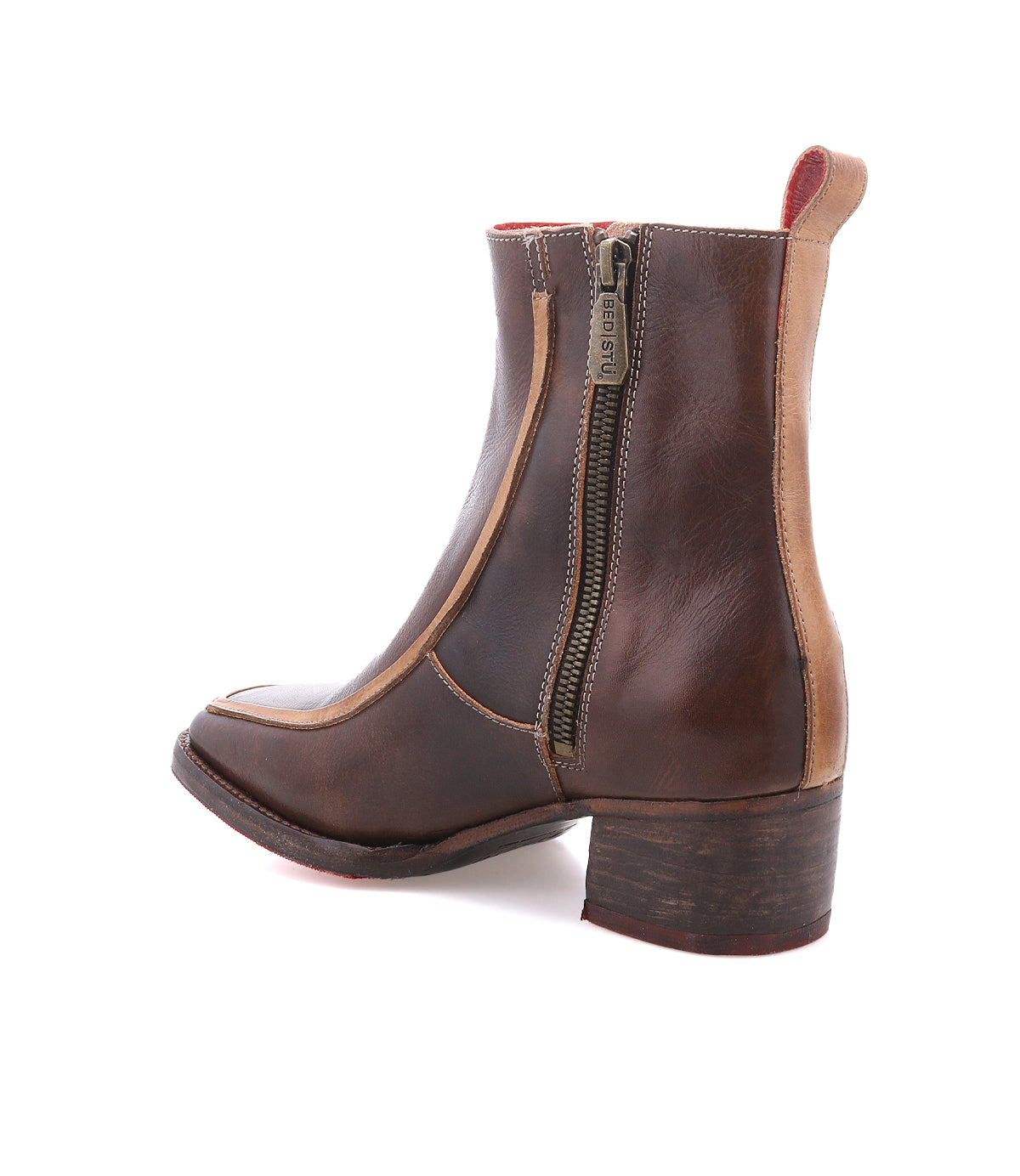 The Bed|Stü Bitsy is a brown leather ankle boot featuring a side zipper, stacked heel, and square toe, shown against a white background—an effortlessly stylish choice to elevate your leather boot collection.