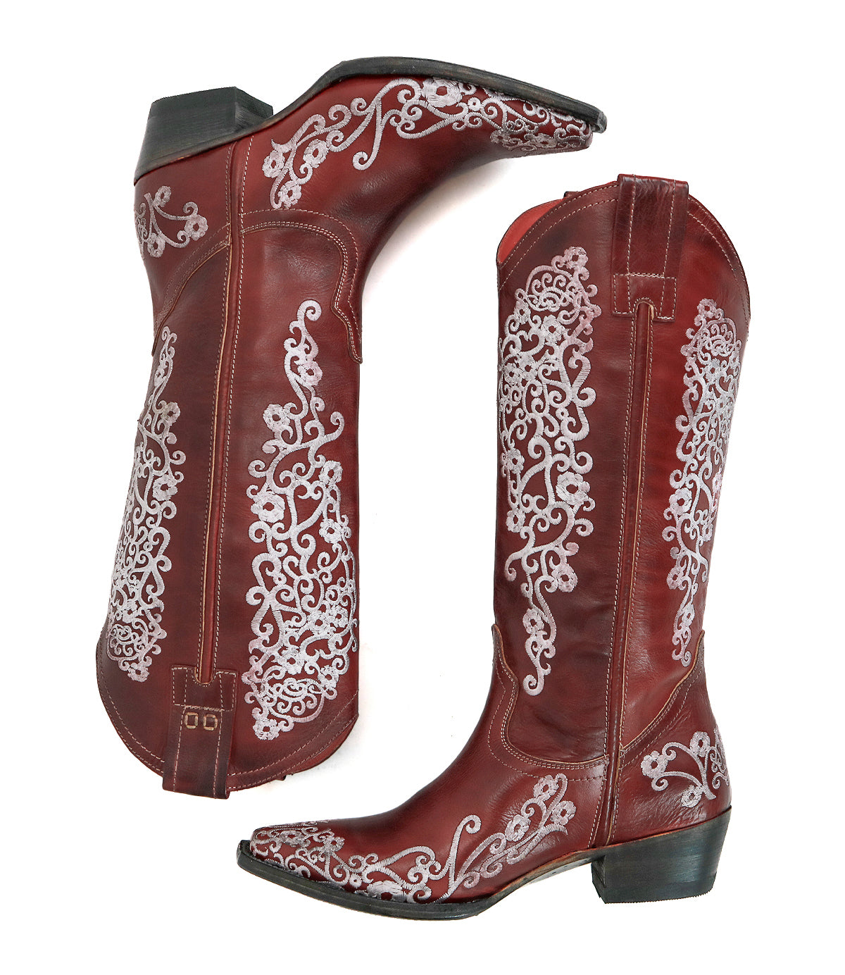 A pair of Bed|Stü Blackjack red leather Western tall boots with white floral embroidery and a snip toe, displayed from the side and bottom views against a white background.