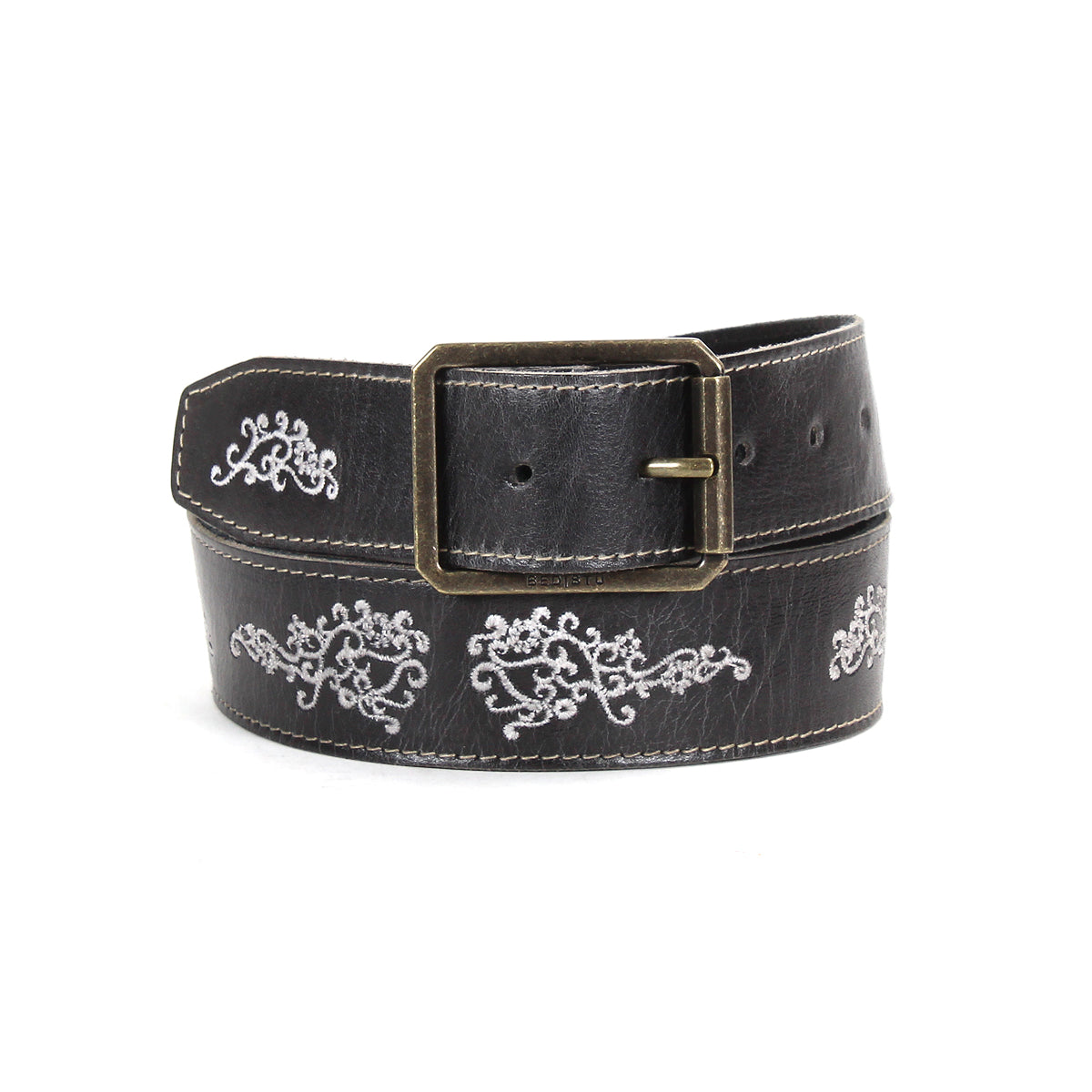 Blaze JB by Bed|Stü is a black full-grain leather belt featuring an antique-finished silver buckle and detailed white embroidered scrollwork patterns along its length.